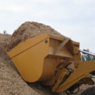 Rollout Bucket West Coast Style for sale Scooping Dirt - Rockland Manufacturing